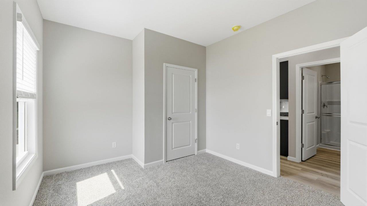 sonora elm bedroom 5 on first floor with carpet flooring and ensuite closet