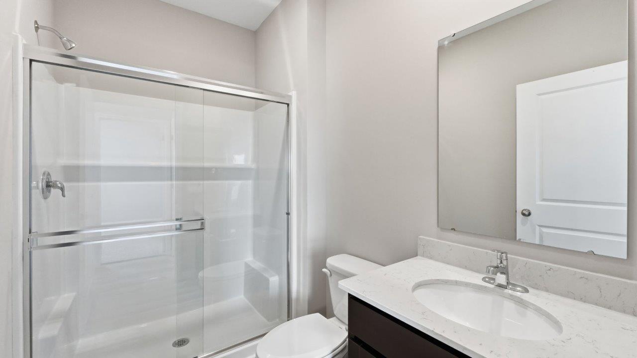 sonora elm first floor full bathroom with walk in shower and single vanity sink