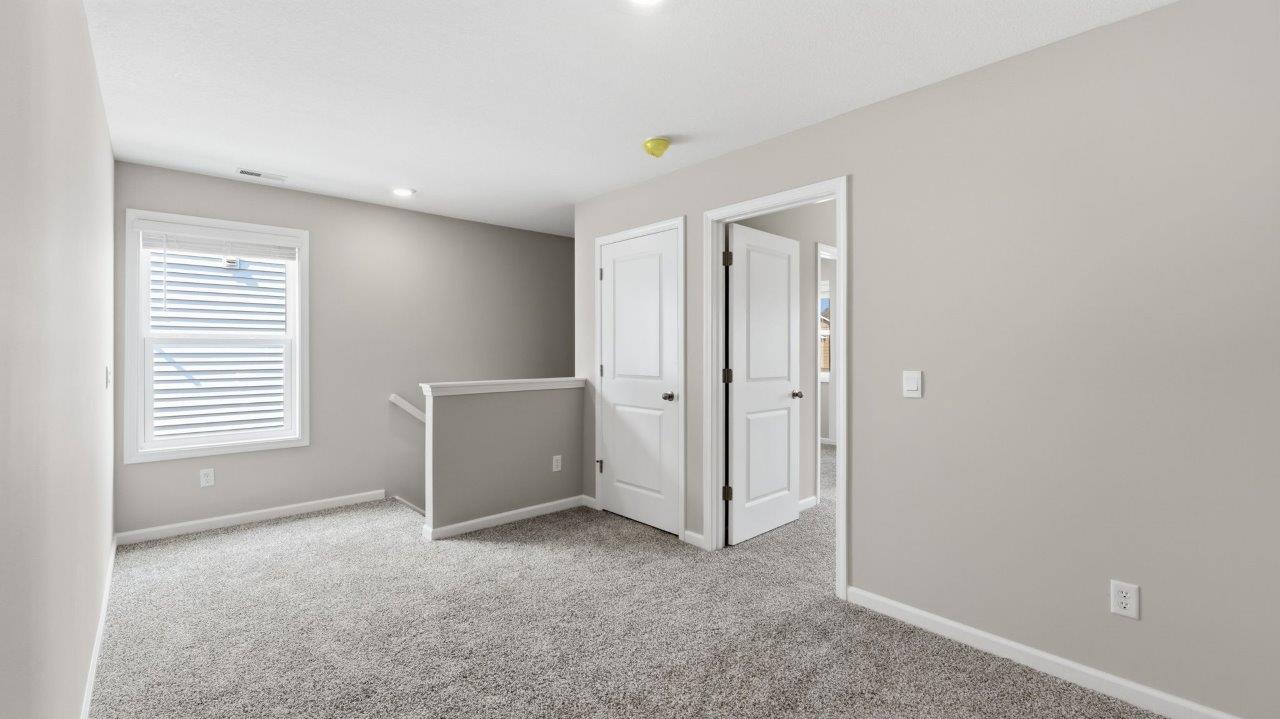 sonora elm second floor loft at stair landing with carpet flooring