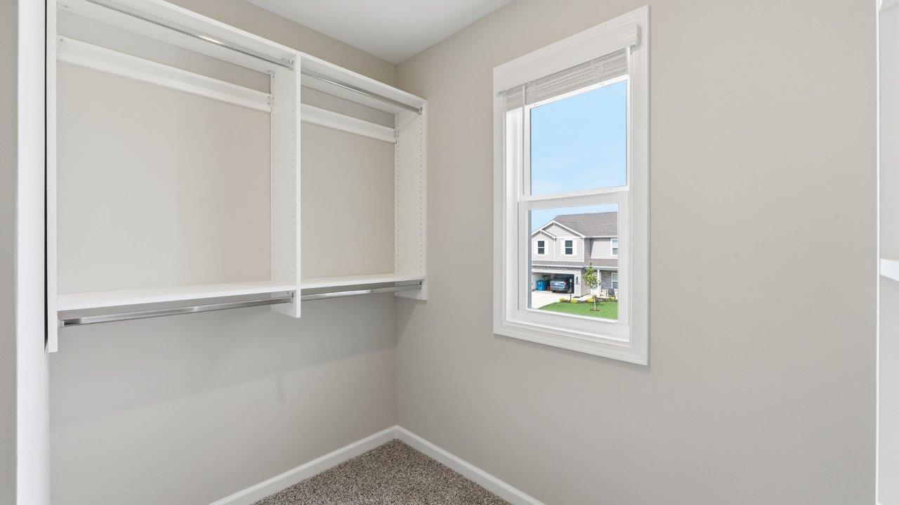 sonora elm primary ensuite closet with built in shelving