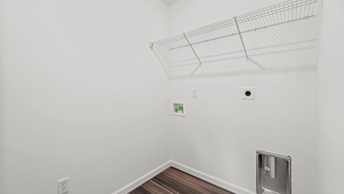 laundry room with hookup and shelving