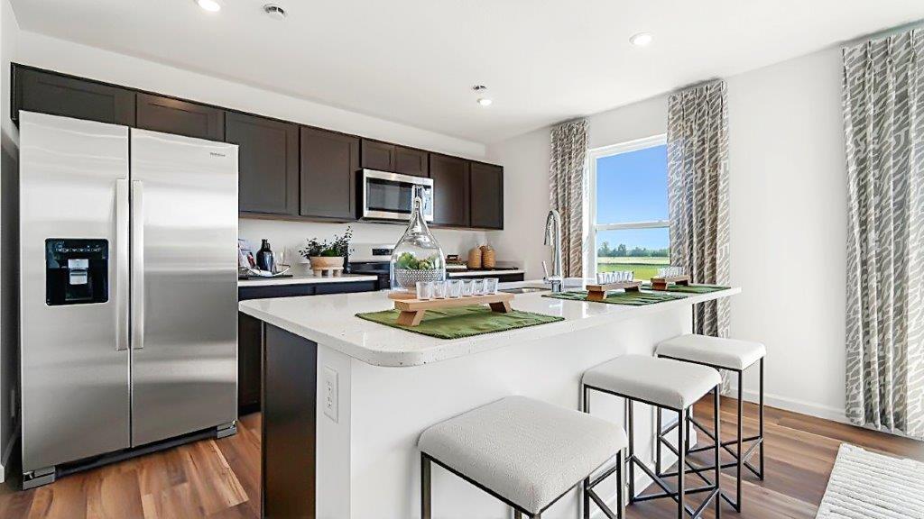 bellamy kitchen with large island with bar seating