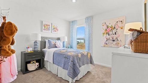 Chatham model bedroom 2 with carpet flooring and single window