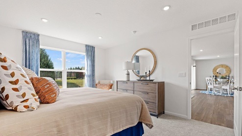 Chatham model home main bedroom with double windows