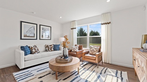 Chatham model home living room with 2 large windows