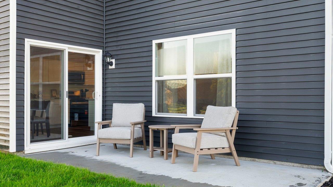 Greenbrier Pine Model Home - rear exterior with concrete patio