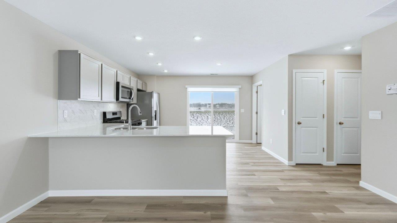 kitchen with sliding door to backyard patio