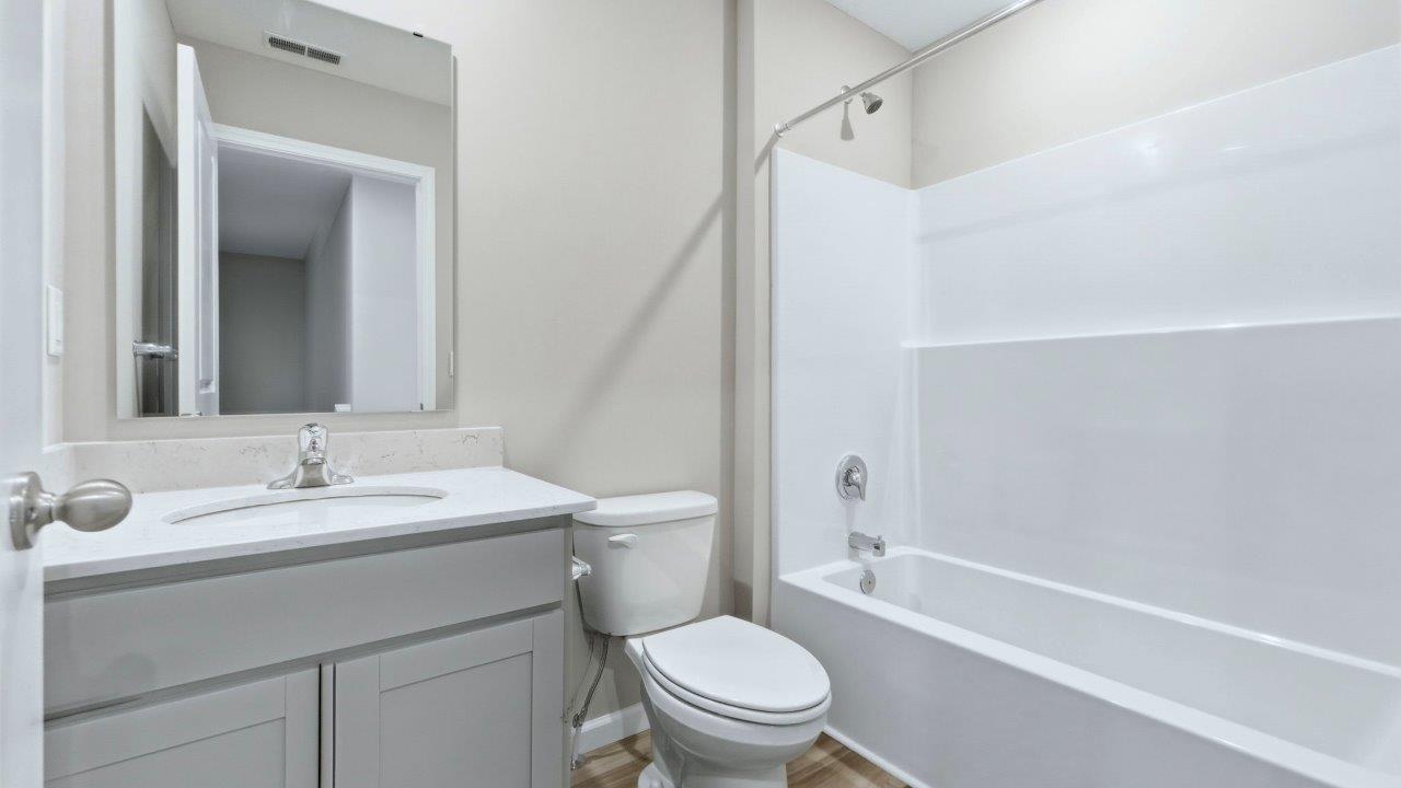 full bathroom with tub shower