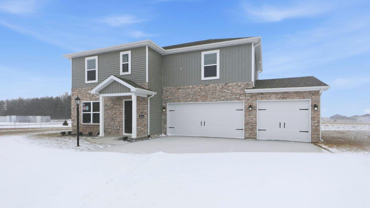 greenbrier fairton exterior with 3 car garage