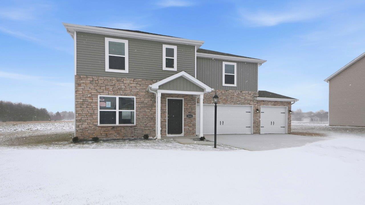 greenbrier fairton exterior with 3 car garage