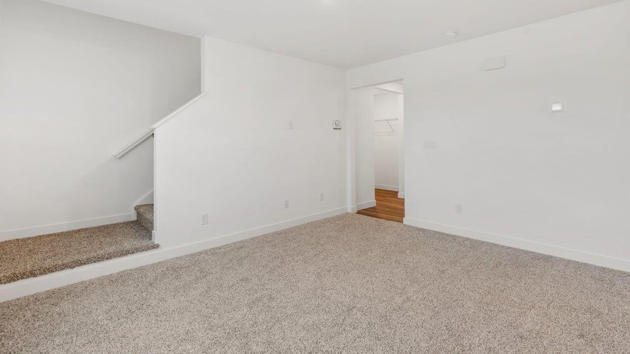 greebrier cabral living room with elk beige carpet flooring