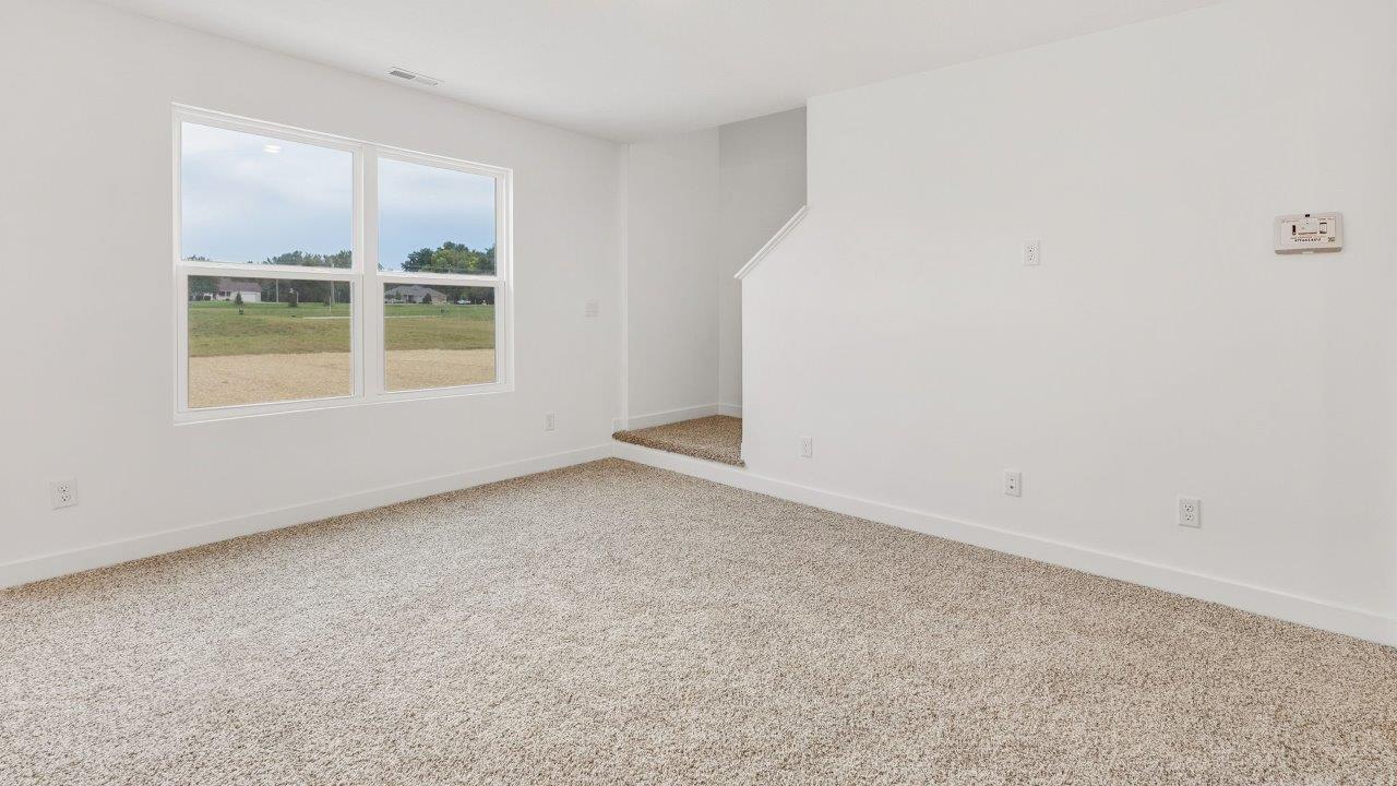 greebrier cabral living room with elk beige carpet flooring