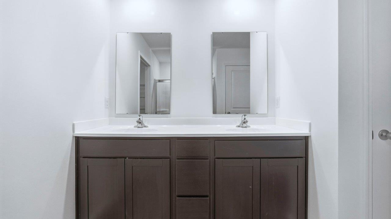 primary ensuite bath with dual sinks