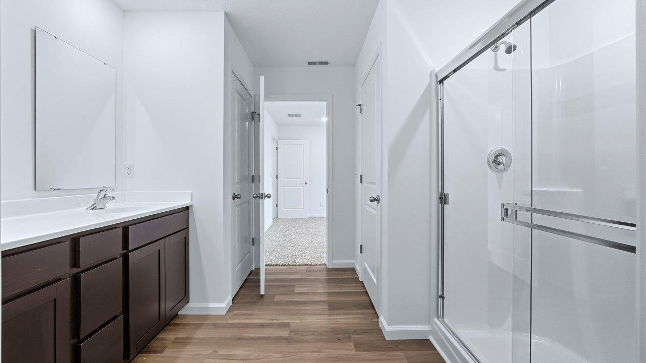 primary ensuite bath with walk in shower