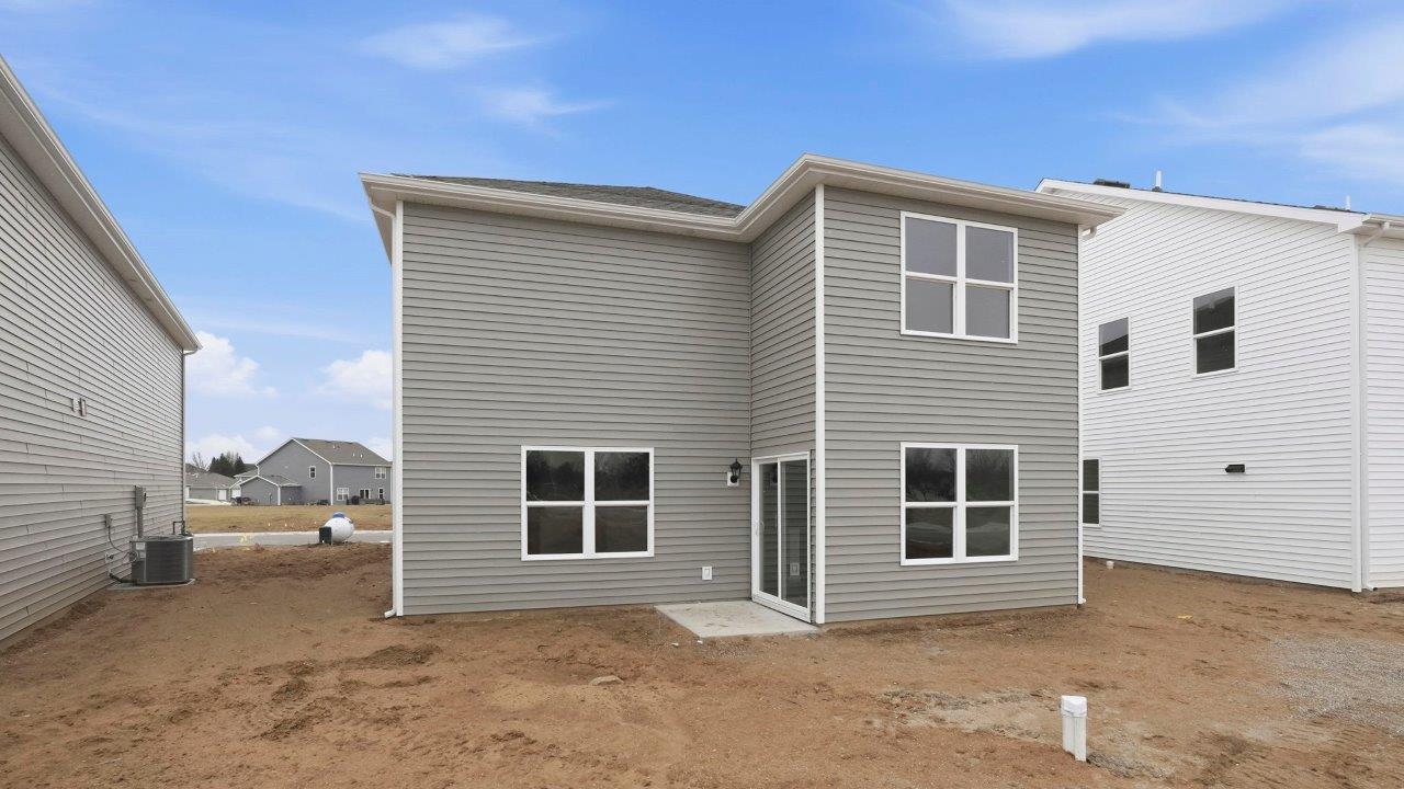 rear exterior with patio