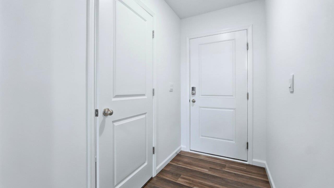 pine front door and main hallway