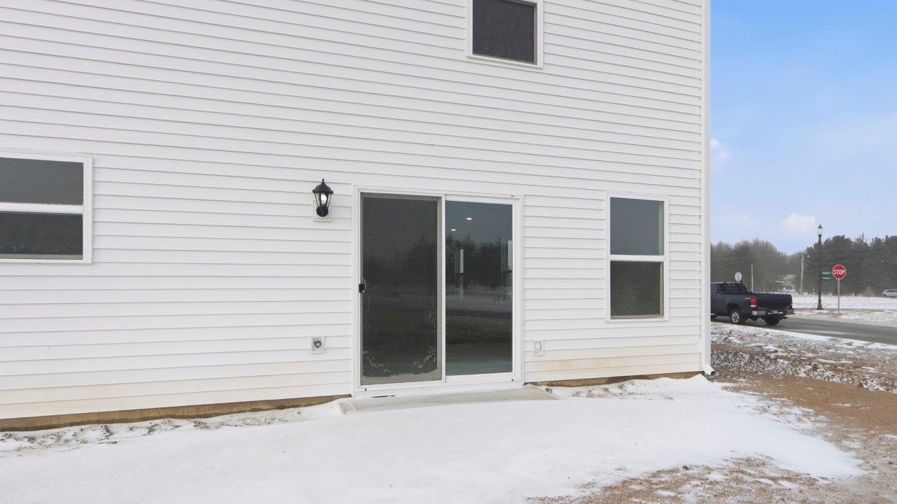 elder exterior with concrete patio