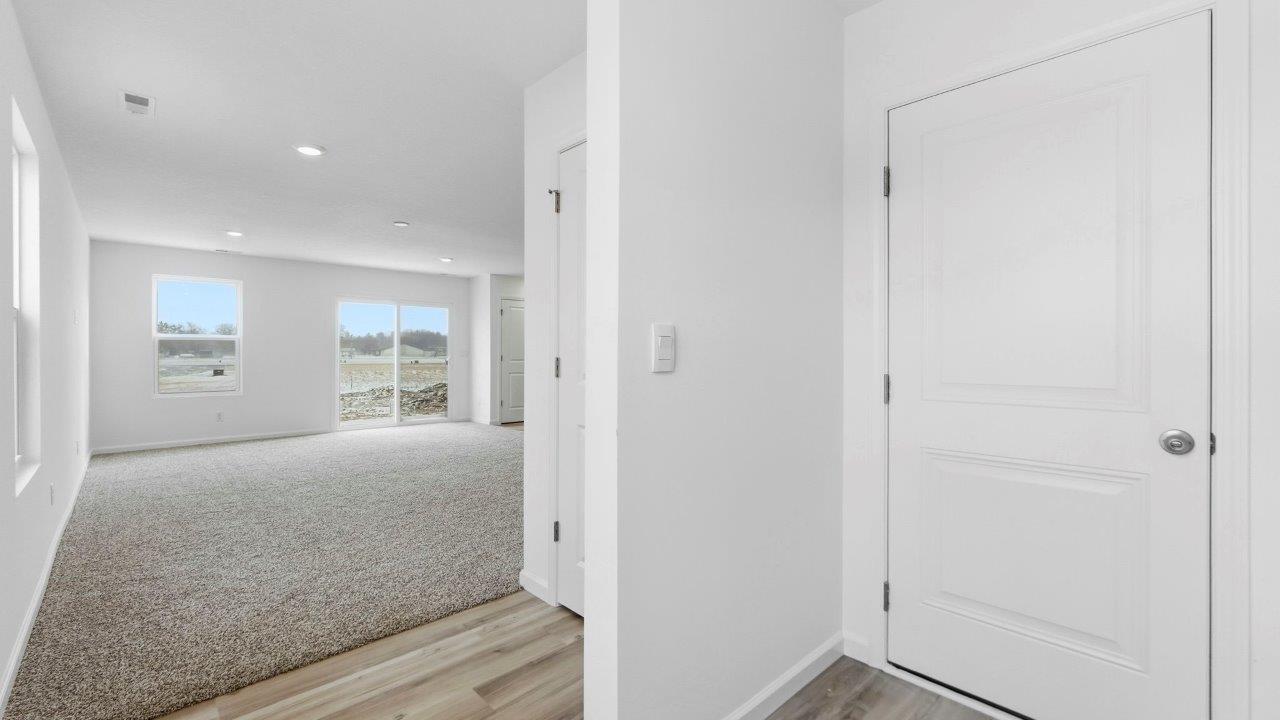 main hall leading to open living room