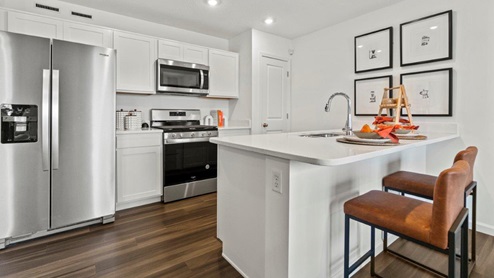 Riverwalk Aldridge Model Home - kitchen island with plenty of room for seating.