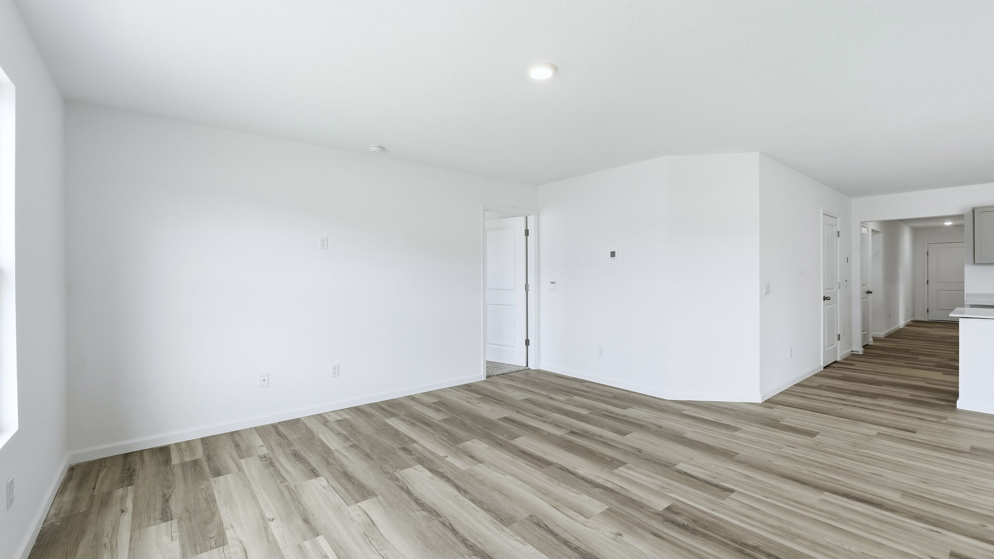 open plan living room with lvp flooring