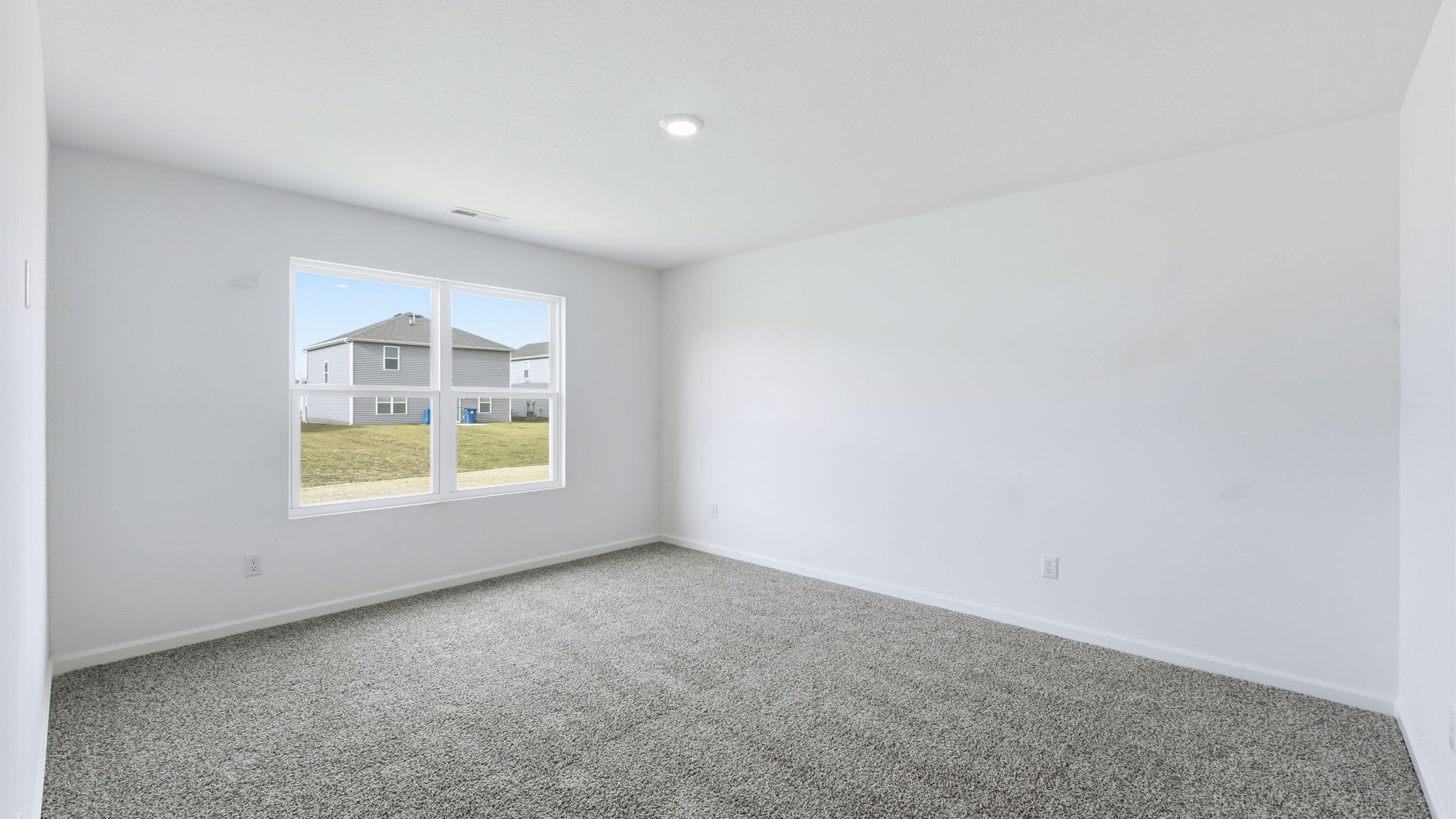 primary bedroom with ensuite bath and closet