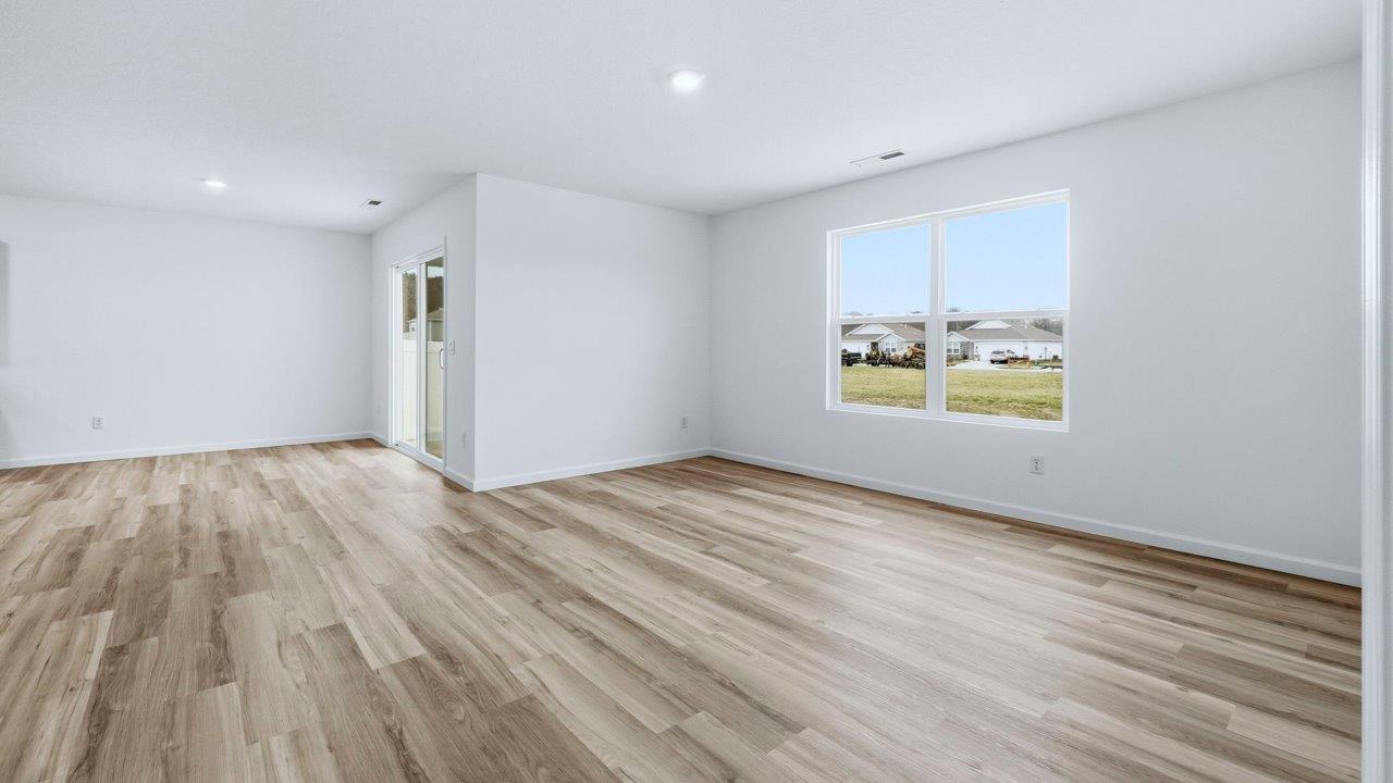 living room open layout with lvp flooring