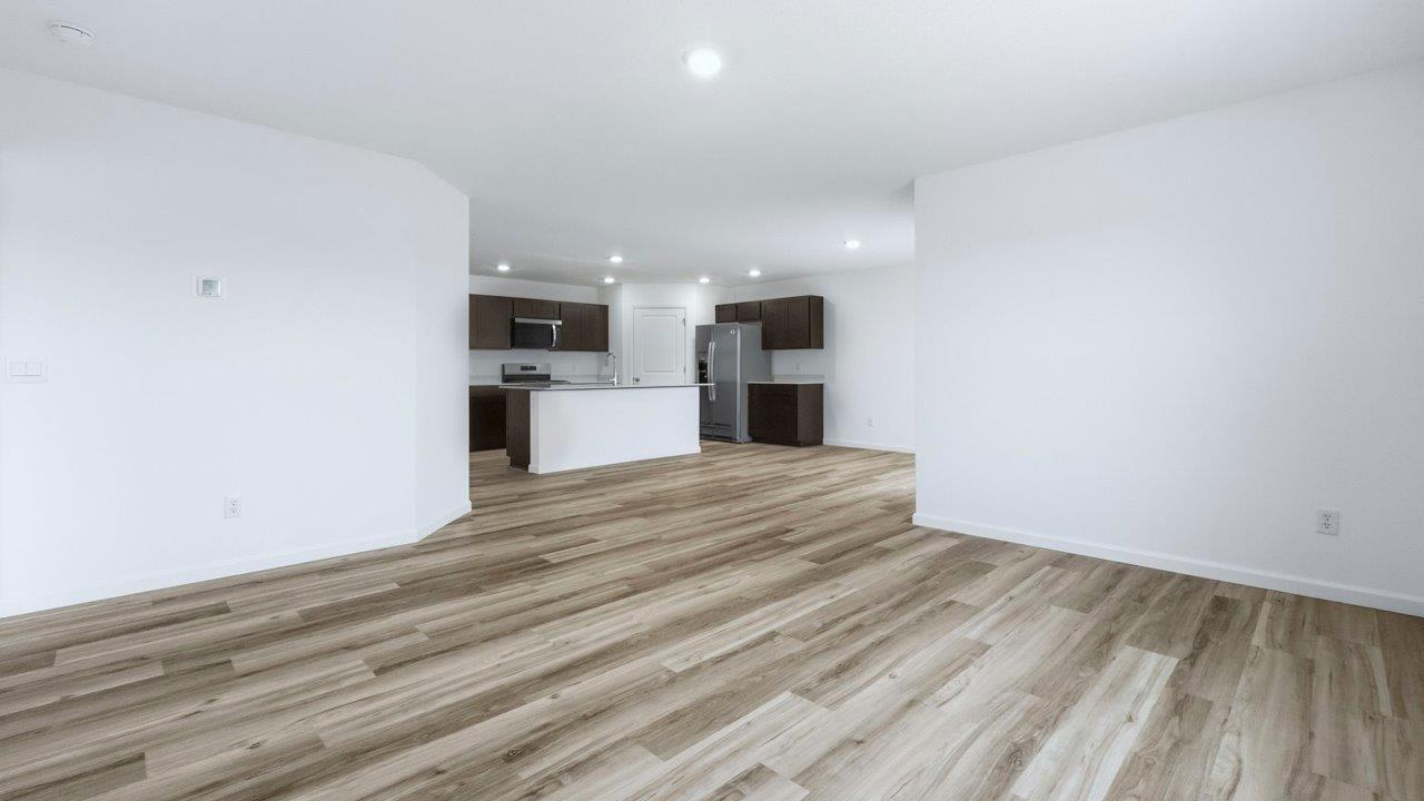 living room open layout with lvp flooring