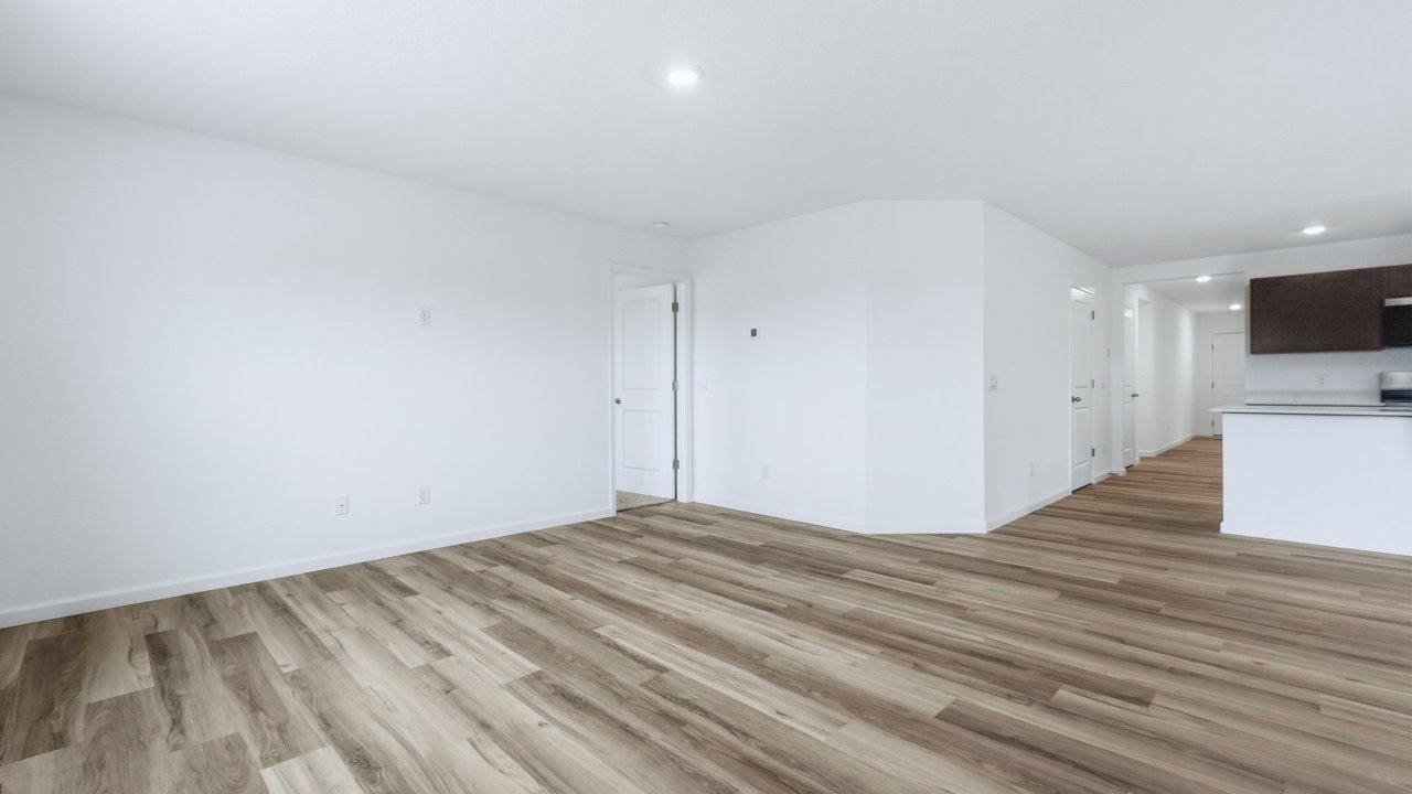 living room open layout with lvp flooring