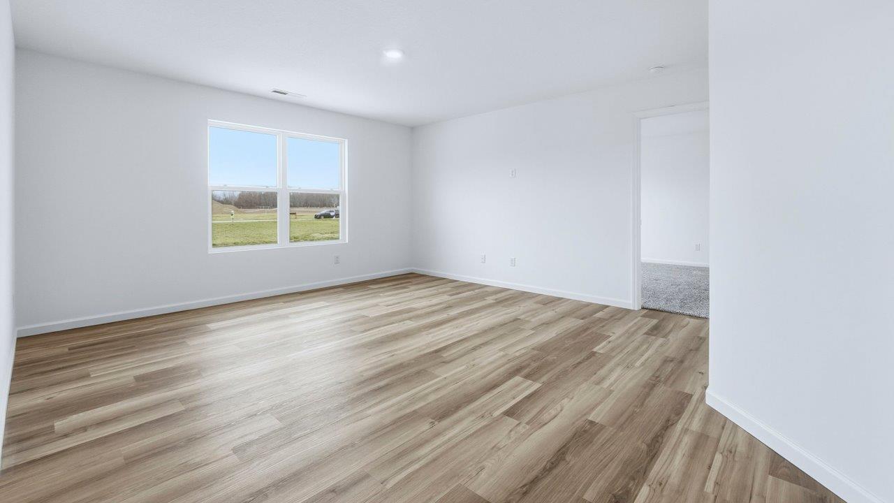 living room open layout with lvp flooring