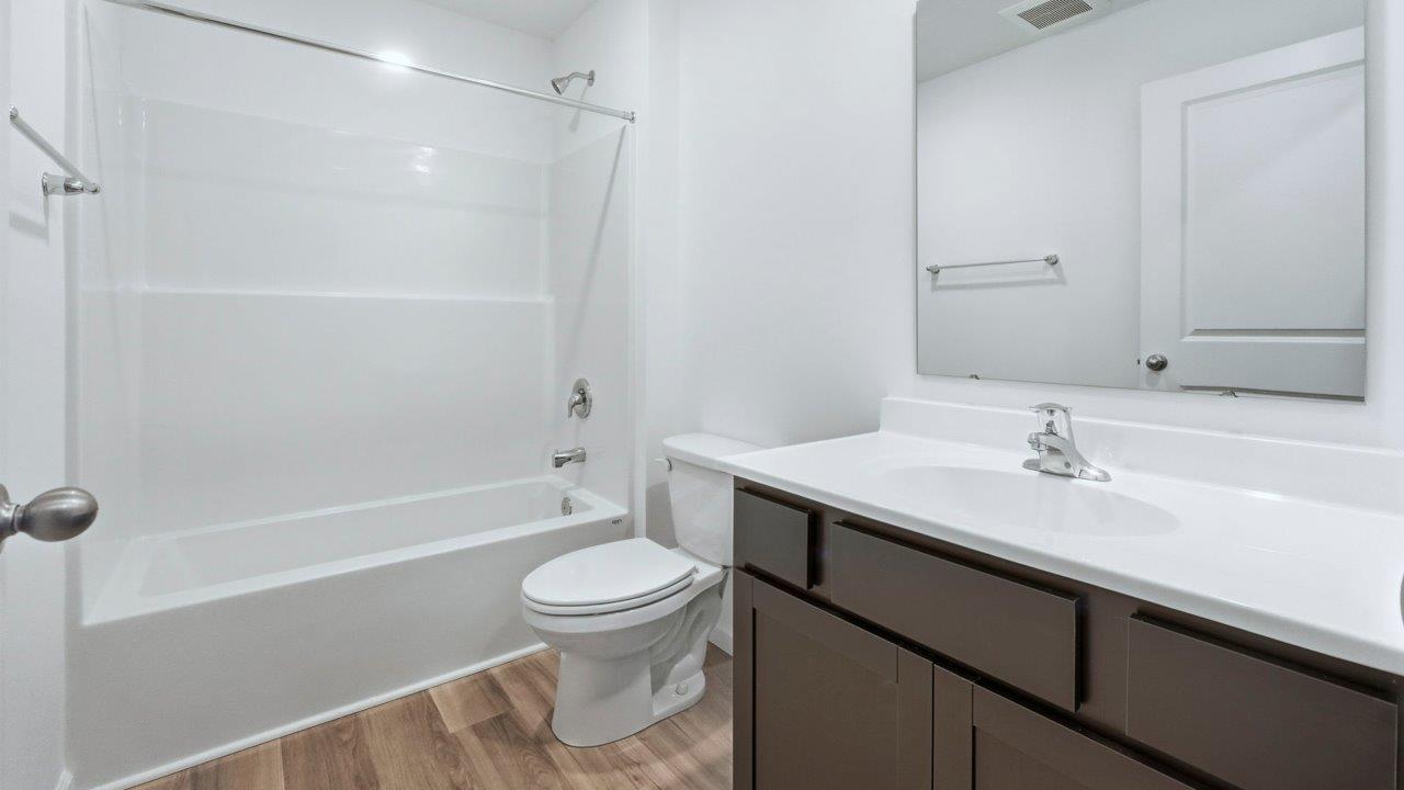 full bathroom with tub shower