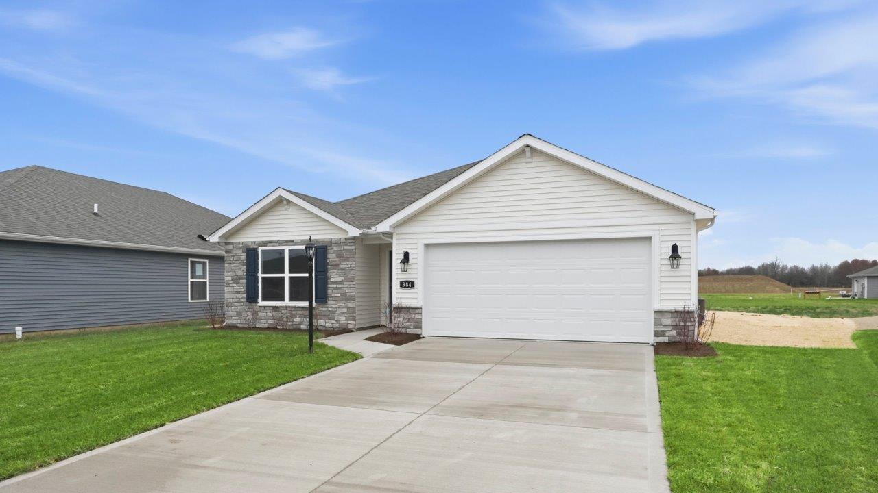 riverwalk chatham - ranch with landscaping, sodded yard, and 2 car garage