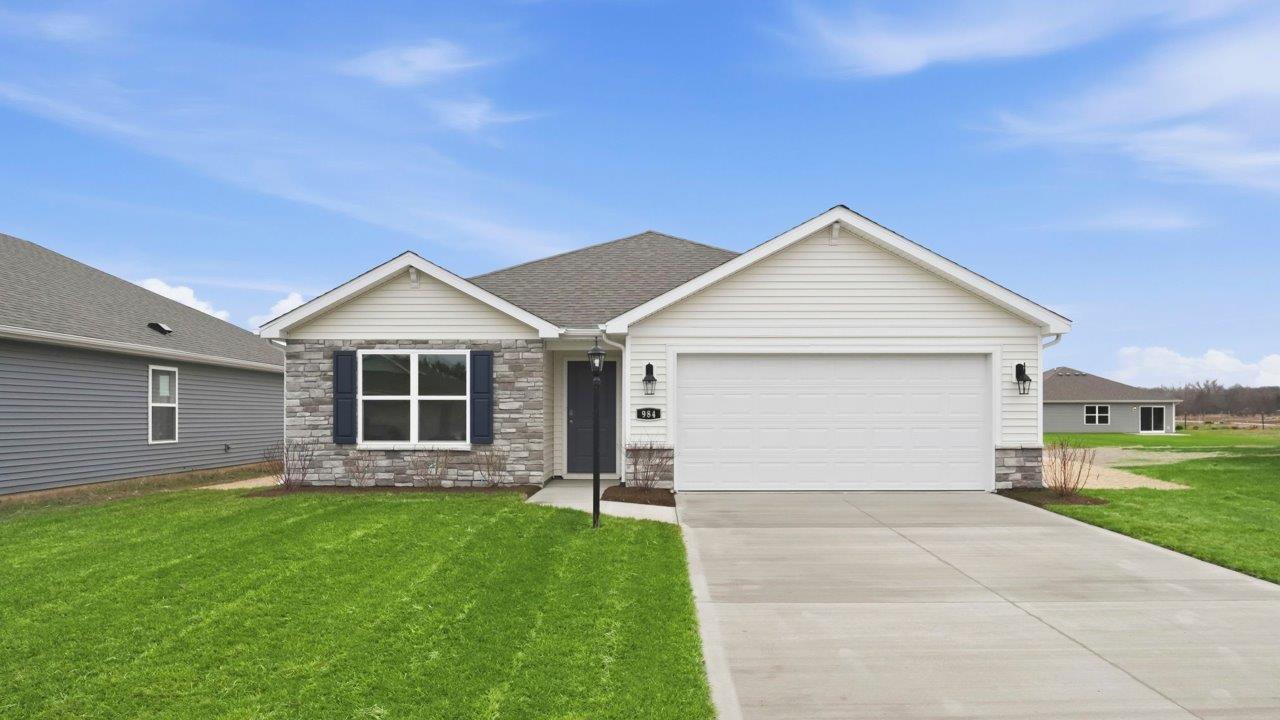 riverwalk chatham - ranch with landscaping, sodded yard, and 2 car garage