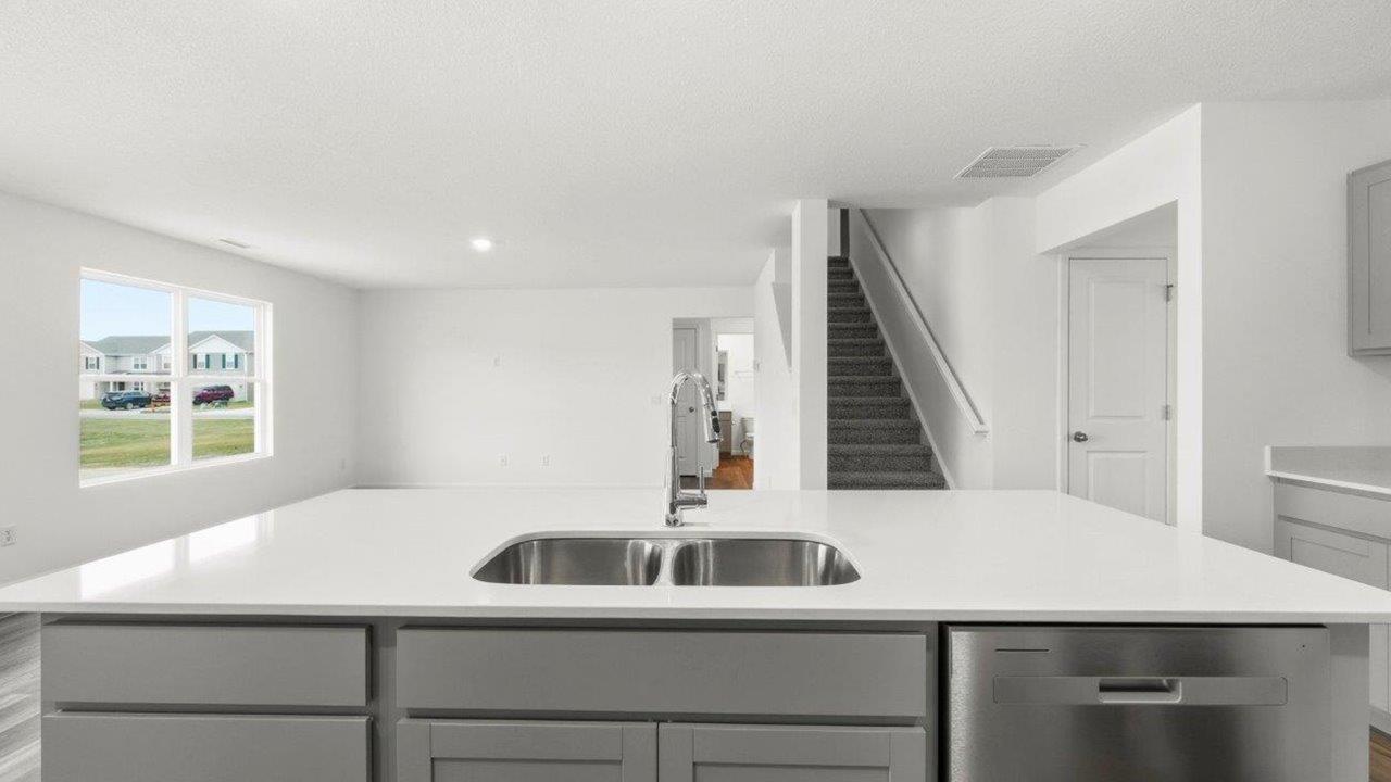 kitchen center island with quartz counters