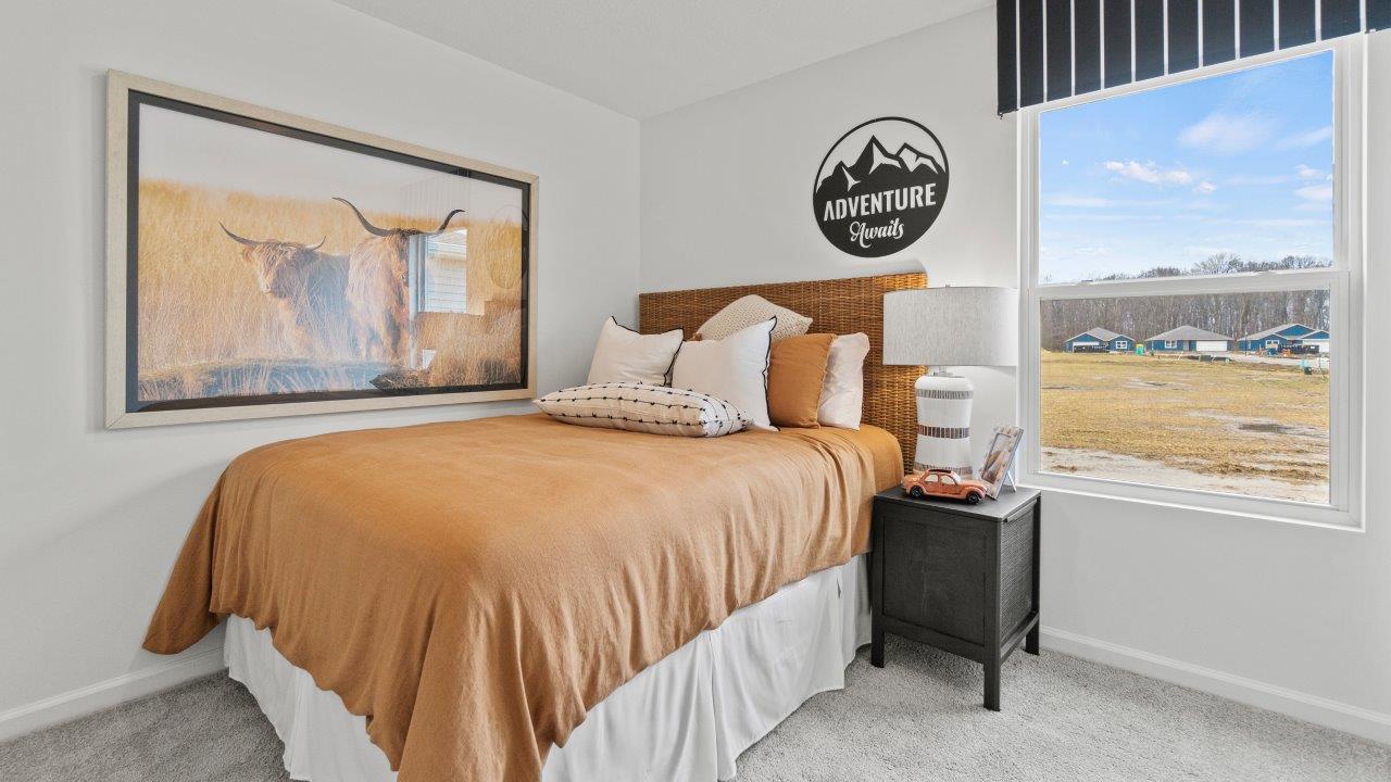 riverwalk aldridge model bedroom 3 with single window, closet, white walls, and elk beige carpet