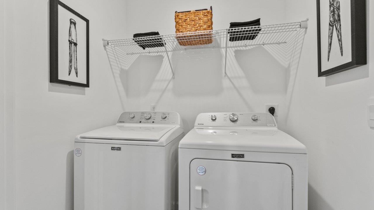 riverwalk aldridge model laundry room with washer and dryer