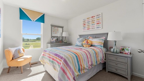 Kennebec Bellamy Model Home Bedroom 2 with single window and decorated as a child's bedroom.
