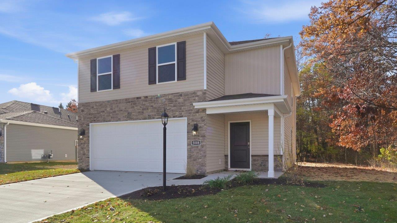 kennebec pine exterior with tree lined homesite