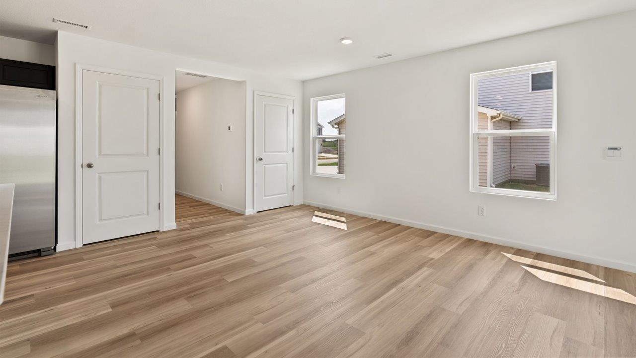 Kennebec Elm C3 - casual dining room with lvp flooring