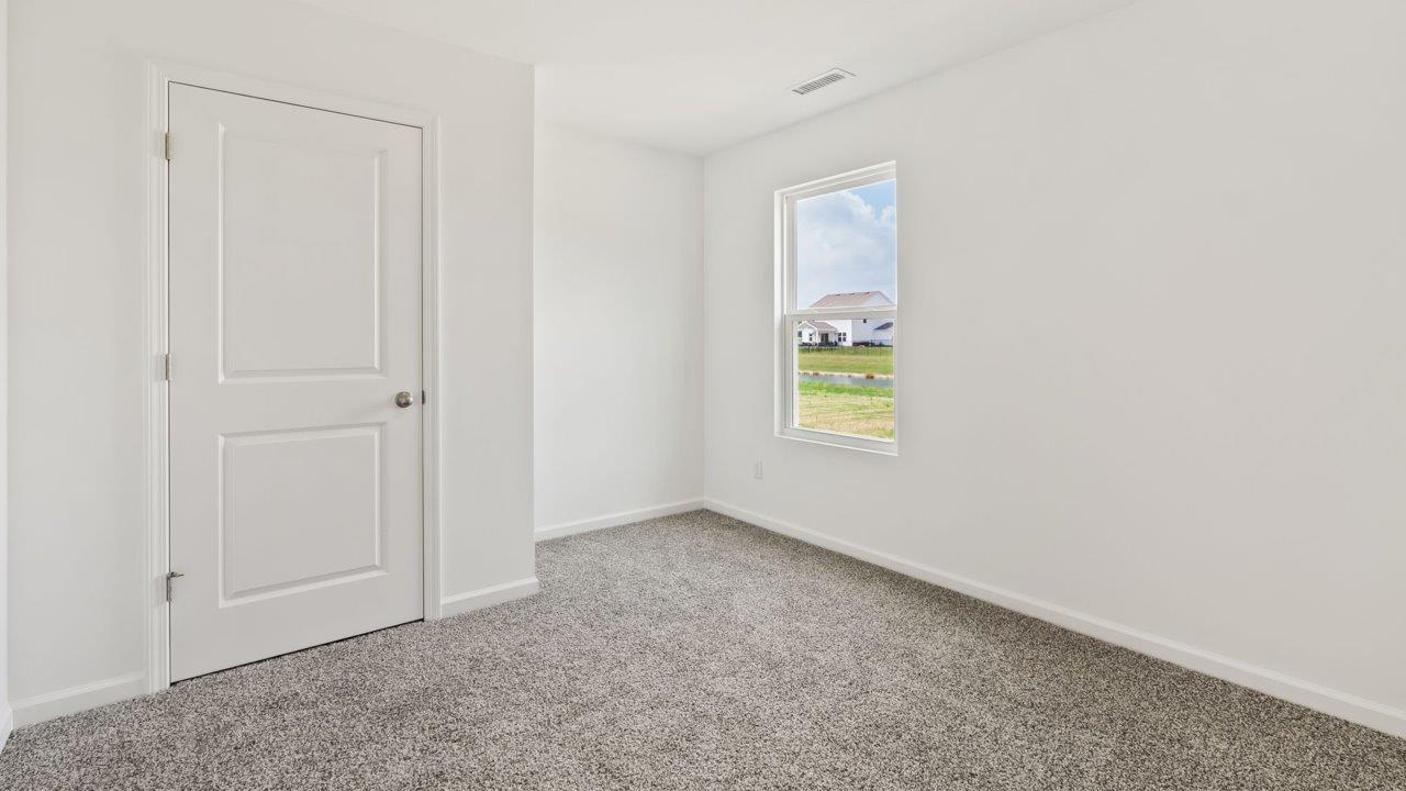 Kennebec Elm C3 - bedroom 2 on first floor with carpet flooring, ensuite closet, single window, and white walls