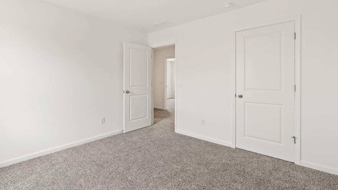 Kennebec Elm C3 - bedroom 3 with beige carpet, white walls, single window, and ensuite closet