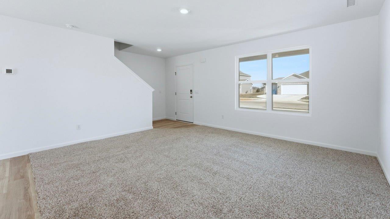 living room with carpet flooring