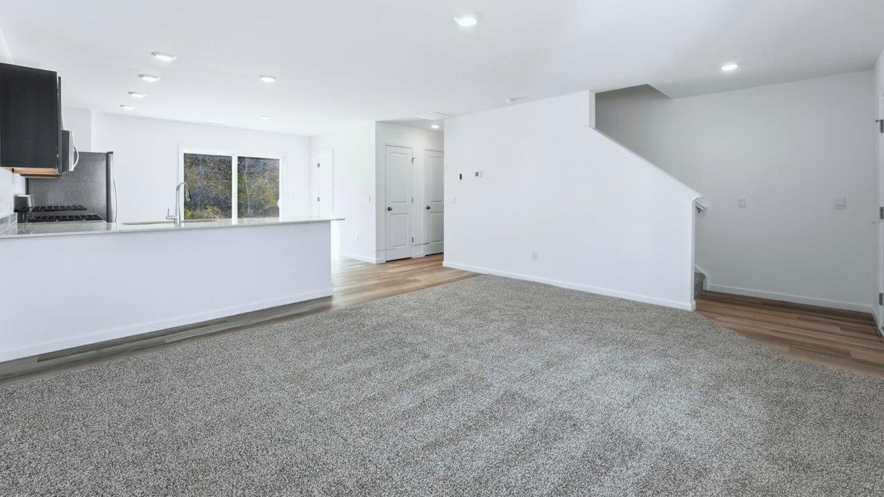 living room with carpet flooring