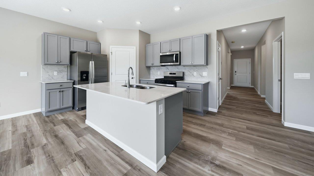 foyer leading into kitchen with open layout