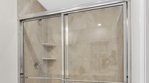 Livingston Lakes paired villas model main bedroom ensuite bathroom