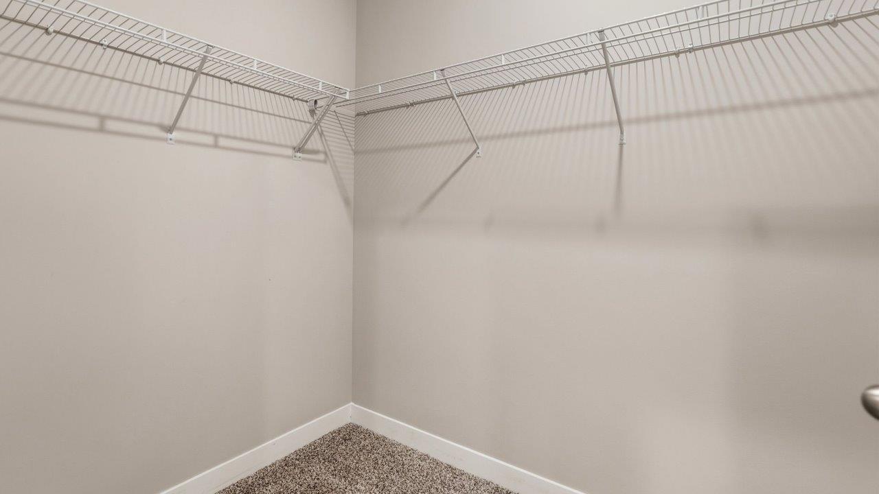 livingston lakes paired villas olsen primary bedroom ensuite walk in closet