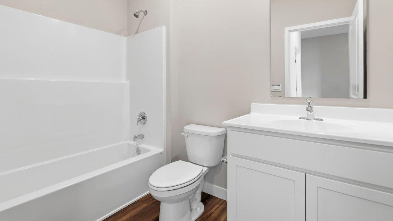livingston lakes paired villas olsen full bathroom with single vanity sink and tub shower