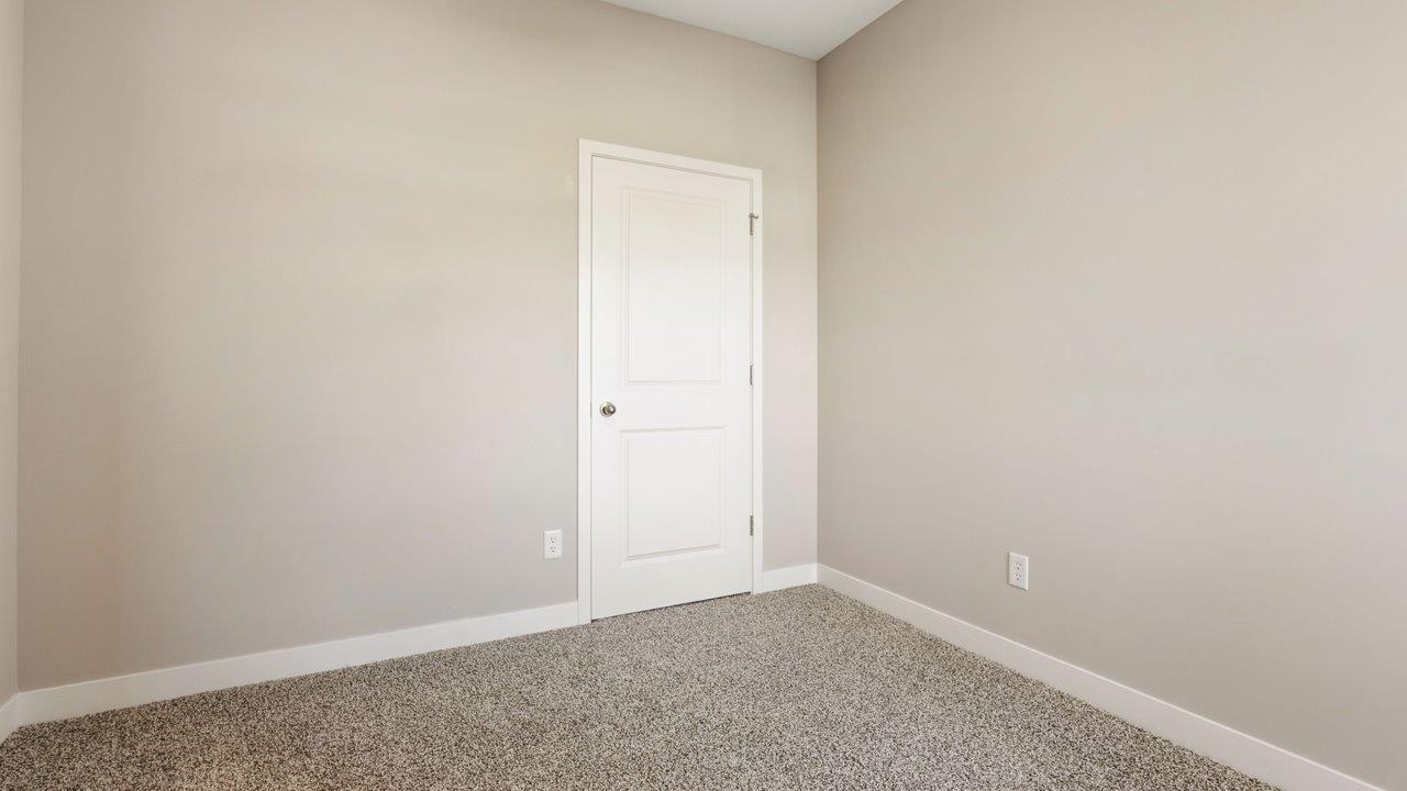 livingston lakes paired villas olsen flex room with french doors and beige carpet