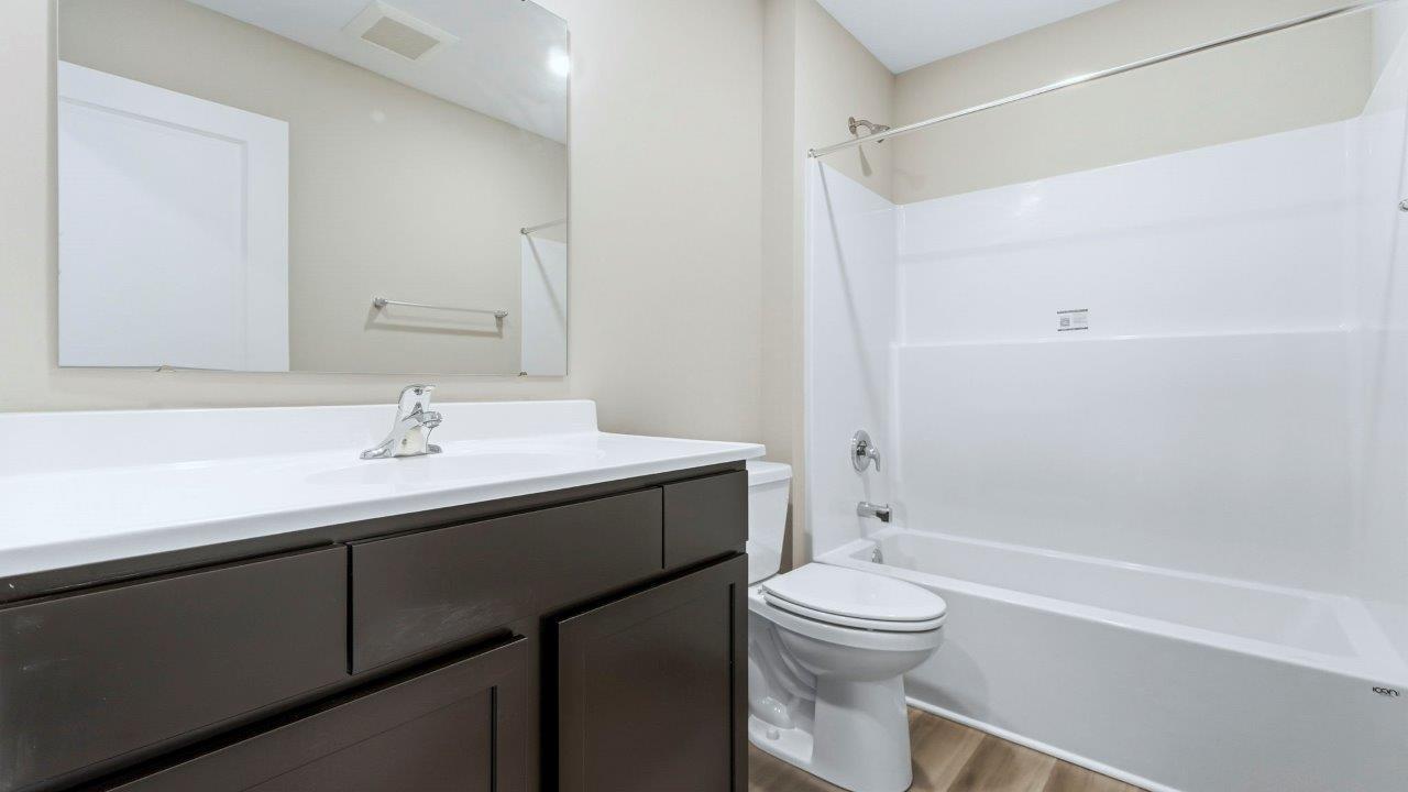 full bathroom with vanity sink and tub shower