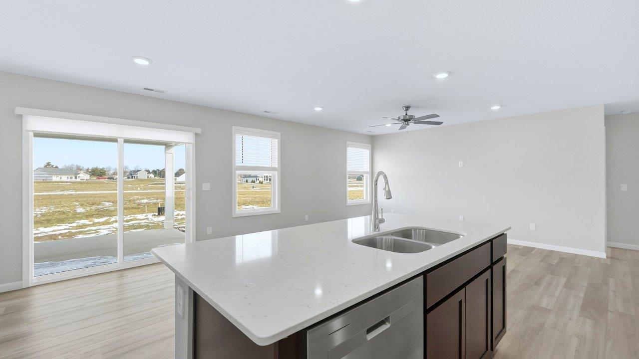 center kitchen island overlooking dining room space