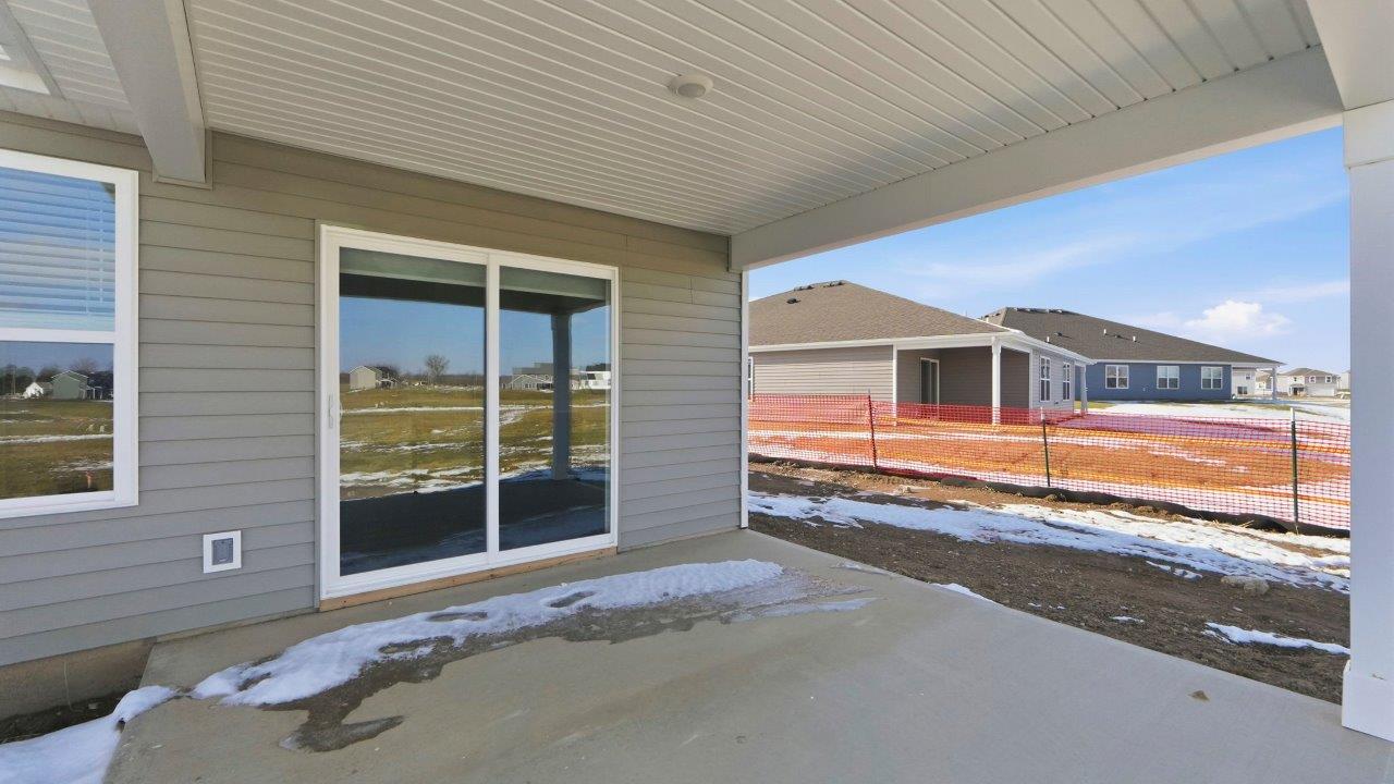 rear exterior hardin plan with covered concrete patio